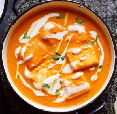  Paneer Butter Masala: A Creamy Symphony of Fragrant Spices and Tender Cheese Cubes!