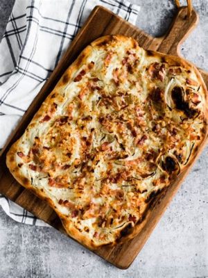  Tarte Flambée: A Symphony of Crispy Dough and Melted Cheese Extravaganza!